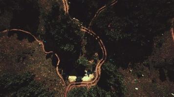 Aerial view of the road through the forest video