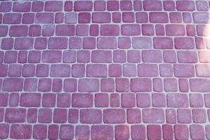 Dark pink bricks texture. photo