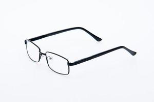 Fashion sunglasses black frames on white background. photo