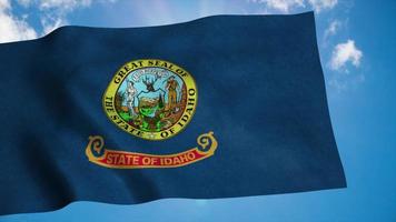 Idaho flag on a flagpole waving in the wind, blue sky background. 3d rendering photo