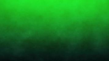 Dark smoke on a green screen background, chroma key photo