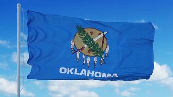 bandera de oklahoma en un asta de bandera ondeando en el viento, fondo de cielo azul. representación 3d foto