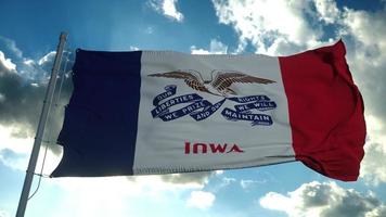 Flag of Iowa waving in the wind against deep beautiful clouds sky. 3d rendering photo