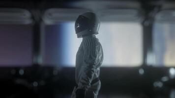 Astronaut going through the tunnel to another compartment of futuristic spaceship. 3d rendering photo