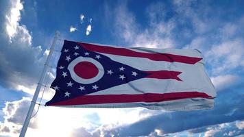 Ohio flag on a flagpole waving in the wind, blue sky background. 3d rendering photo