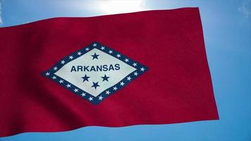 Arkansas flag waving in the wind, blue sky background. 3d rendering photo