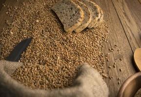 sliced bread on wooden background photo