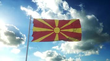 Flag of Macedonia waving at wind against beautiful blue sky. 3d rendering photo
