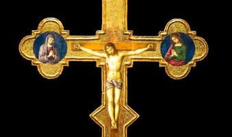Antique crucifix made of gold - Roman Catholic Church, Jesus Christ. photo