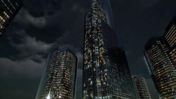 Glass Skyscrpaer Office Buildings with dark sky video