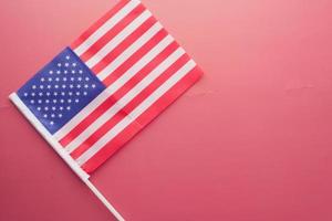 American flag on red background top view photo