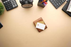 top view of credit cards in a wallet on yellow background photo