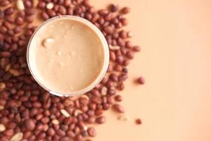 top view of peanut butter in a container , photo