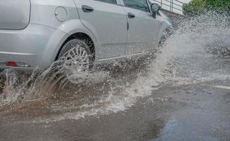 Driving on flooded road photo