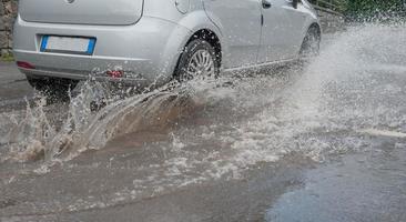 Driving on flooded road photo