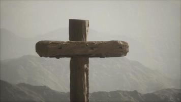 wooden Crucifix cross at mountain video