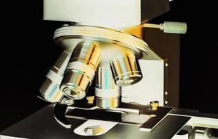 Close up of microscope at the laboratory. photo