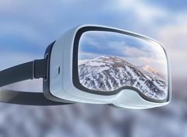 auriculares de realidad virtual, exposición doble, paisaje majestuoso de las montañas de invierno foto