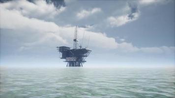 Large Pacific Ocean offshore oil rig drilling platform video
