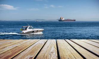 Big Chemical Tanker and powerboat photo