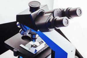Close up of microscope at the laboratory. photo
