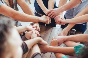 Group of Diverse Hands Together Joining. Concept  teamwork and friendship photo