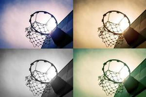 Wooden basketball hoop during sunset. photo