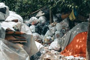 Messy pile of garbage bags