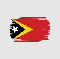 trazos de pincel de bandera de timor leste. bandera nacional del país vector