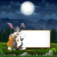 Easter bunny carrying a sack of Easter eggs in front the blank sign vector
