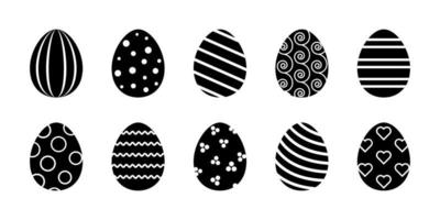 Vector Easter eggs glyph collection. Set of black rubber stapms with decorated eggs