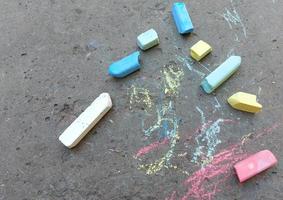 colored chalk on the asphalt. creativity, summer, creativity. copy space, place for text. photo