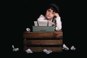 Boy with typewriter photo