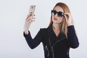 Beautiful Young woman taking a selfie photo