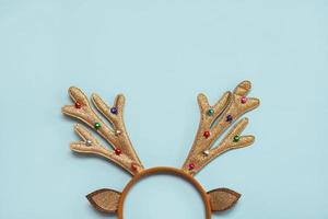 Merry Christmas. Bright Christmas Toy deer antlers with copy space. Christmas concept background photo
