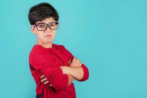 angry boy with glasses photo