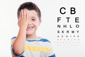 smiling child at the oculist photo