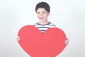 happy child with a red heart photo