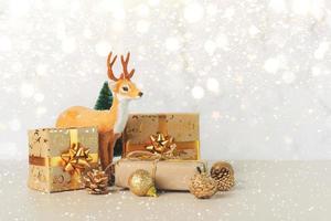 Merry Christmas. Reindeer with christmas gifts and christmas lights. Christmas concept background. Selective focus photo