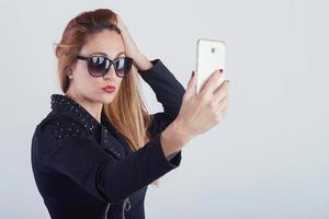 Beautiful Young woman taking a selfie photo