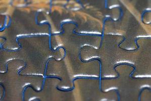 detail view puzzle with brown stones with blue photo