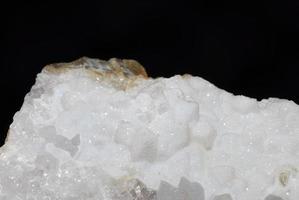 white mineral and black background photo