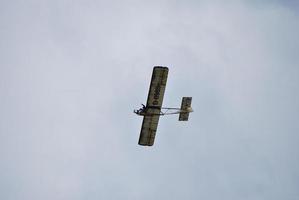 old aircraft on the sky photo