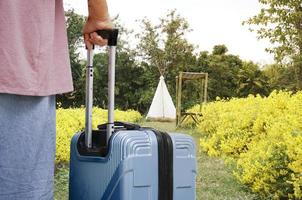 Travel asian woman travel in flower garden. photo