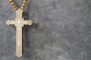 Christian cross with cement background. photo