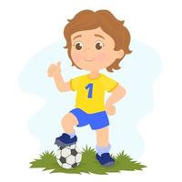 niño en ropa deportiva posando con una pelota de fútbol vector