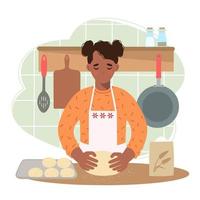 mujer afroamericana en la cocina prepara bollos esponjosos