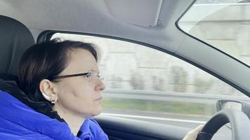 Young Woman is Driving Car video