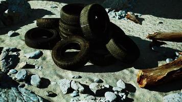 old abandoned tyres on sea shore video