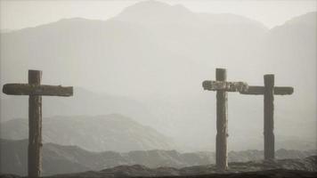 wooden Crucifix cross at mountain video